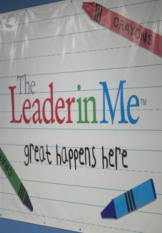 Mottos, mission statements and motivational signs abound in the school. Photo by Walt Stricklin