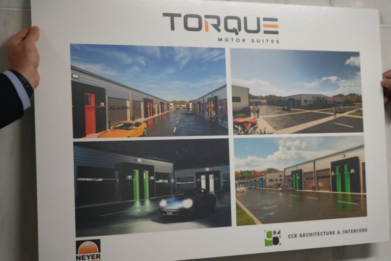 City workers display a rendering of the car condo proposed to be built near Barber Motorsports. (Source: City of Birmingham)