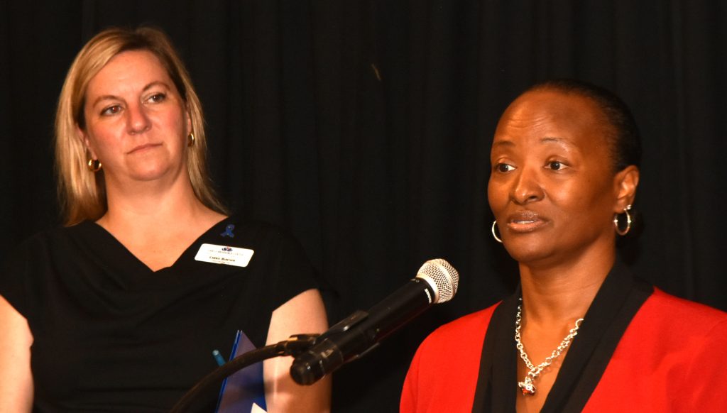 Judge Janine Hunt-Hilliard speaks as Carrie Buntain, executive director of the Family Resource Center, looks on during an Apr. 27, 2026 press conference. 